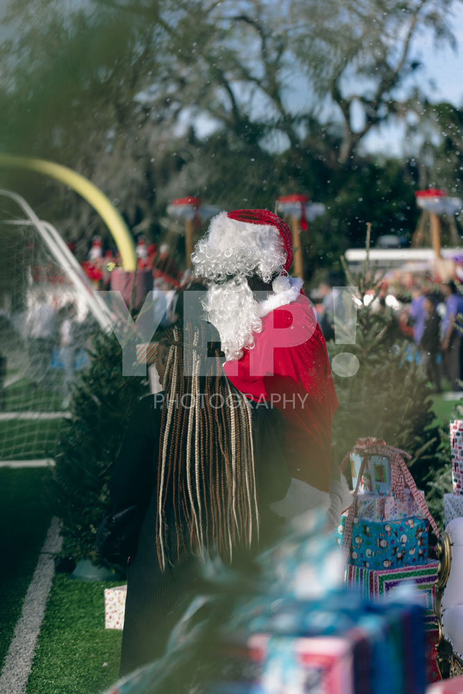 03-titusoneil-wwe-skanska-event-joyofgiving-yepphotography-yep-photography-gabrielsphotography-1 Yep-photography-children-receiving-presents-and-taking-photos-with-santa-claus-at-the-joy-of-giving-charity-event-spreading-holiday-cheer-and-kindness