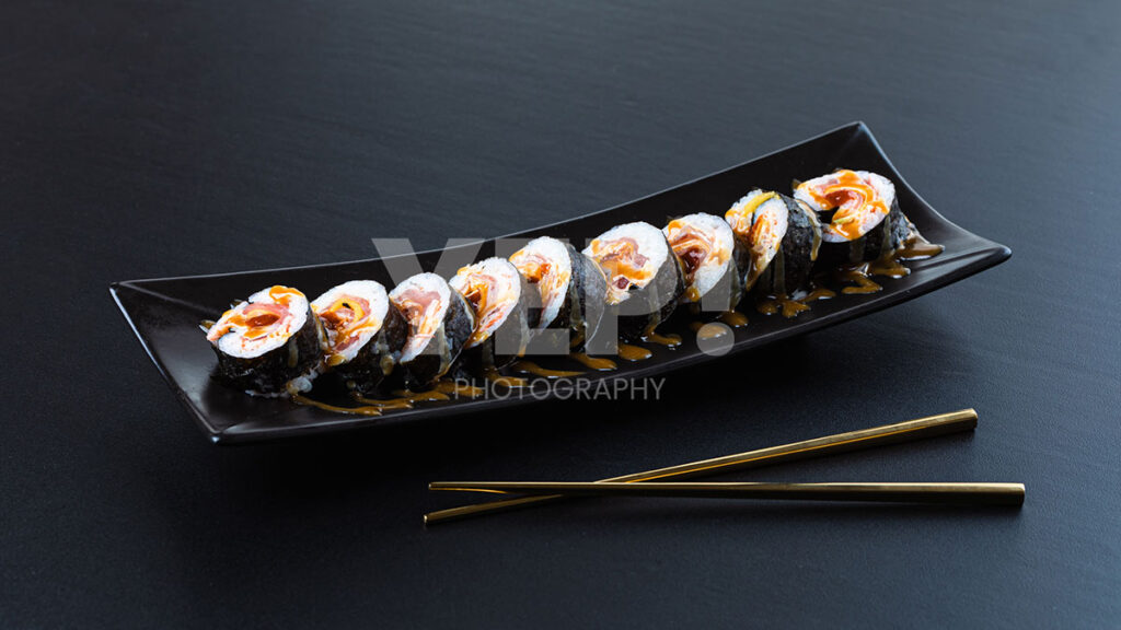 07-sushiyalebanon-sushiya-sushi-yep-photography-gabrielsphotography-restaurant-catering Colorful sushi platter at SushiYa restaurant in Beirut, lebanon. Includes various rolls, nigiri, and garnishes.