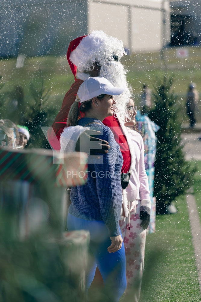 08-titusoneil-wwe-skanska-event-joyofgiving-yepphotography-yep-photography-gabrielsphotography-1 Yep-photography-children-receiving-presents-and-taking-photos-with-santa-claus-at-the-joy-of-giving-charity-event-spreading-holiday-cheer-and-kindness