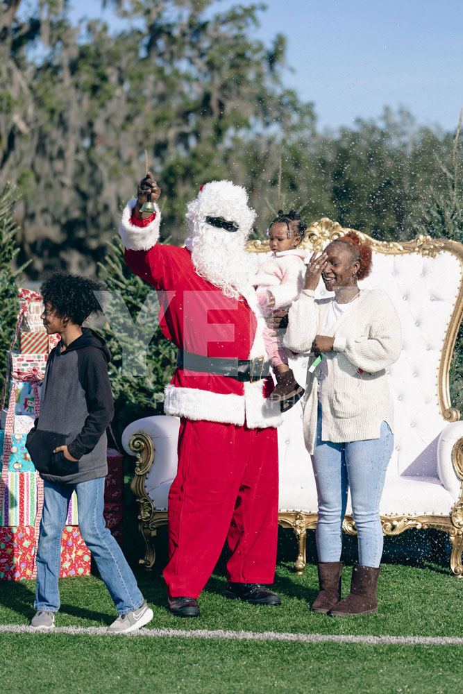 12-titusoneil-wwe-skanska-event-joyofgiving-yepphotography-yep-photography-gabrielsphotography Yep-photography-children-receiving-presents-and-taking-photos-with-santa-claus-at-the-joy-of-giving-charity-event-spreading-holiday-cheer-and-kindness